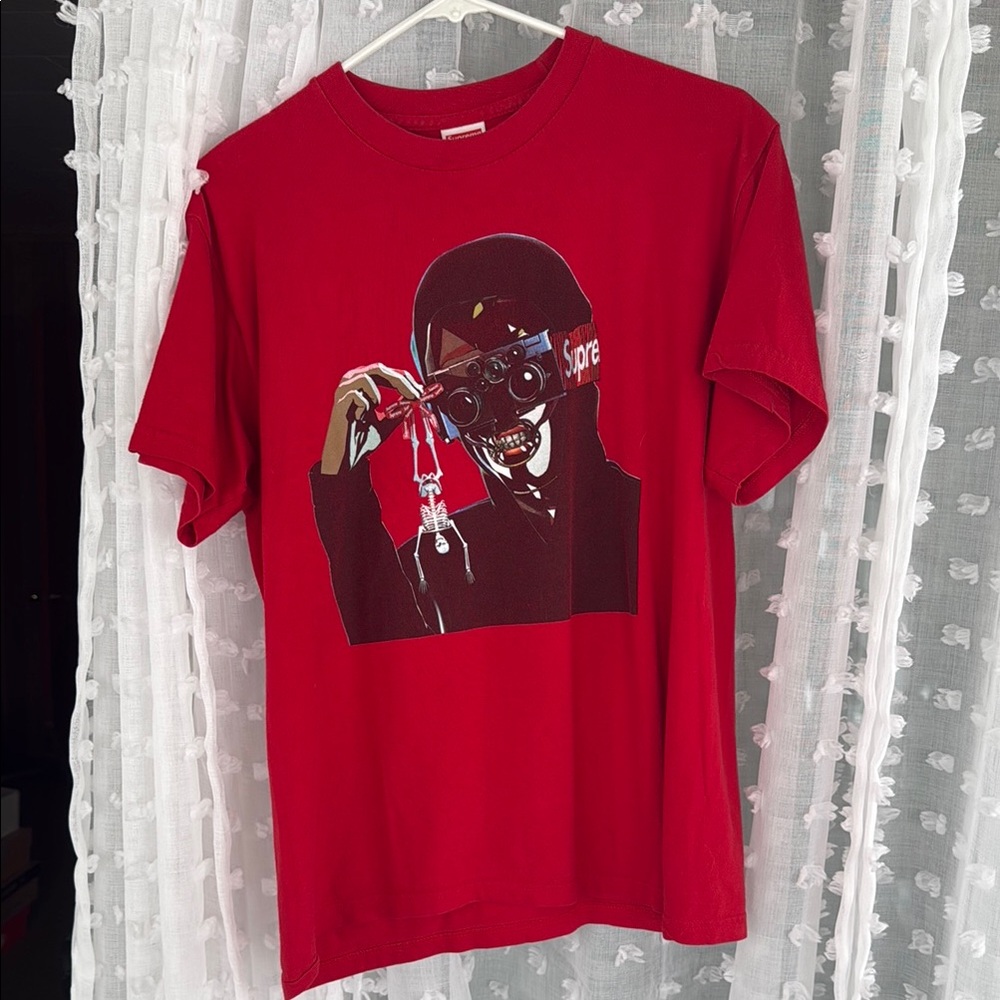 Supreme Red Graphic Tee with Bold Design
